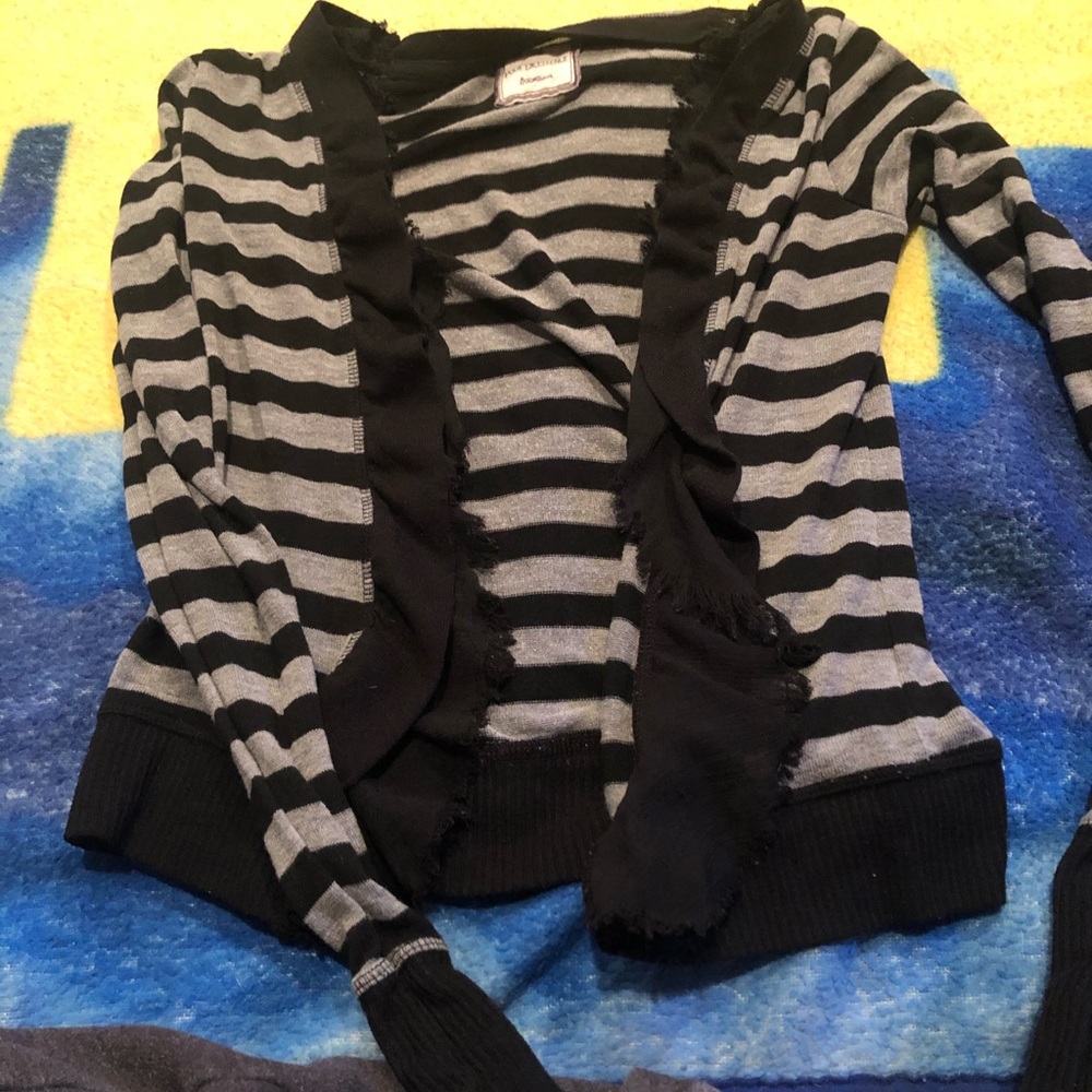 Black and grey striped shawl sweater.